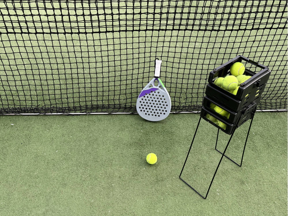 Padelbat ved nettet